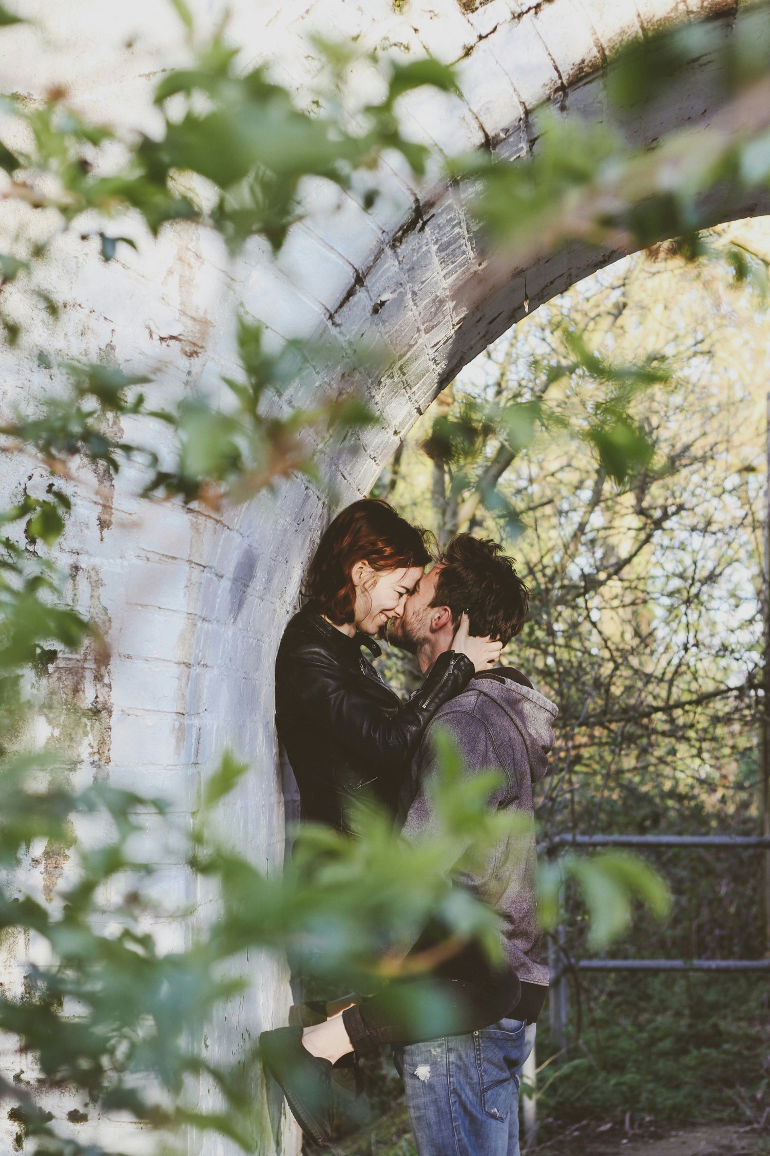 couple kissing in nature