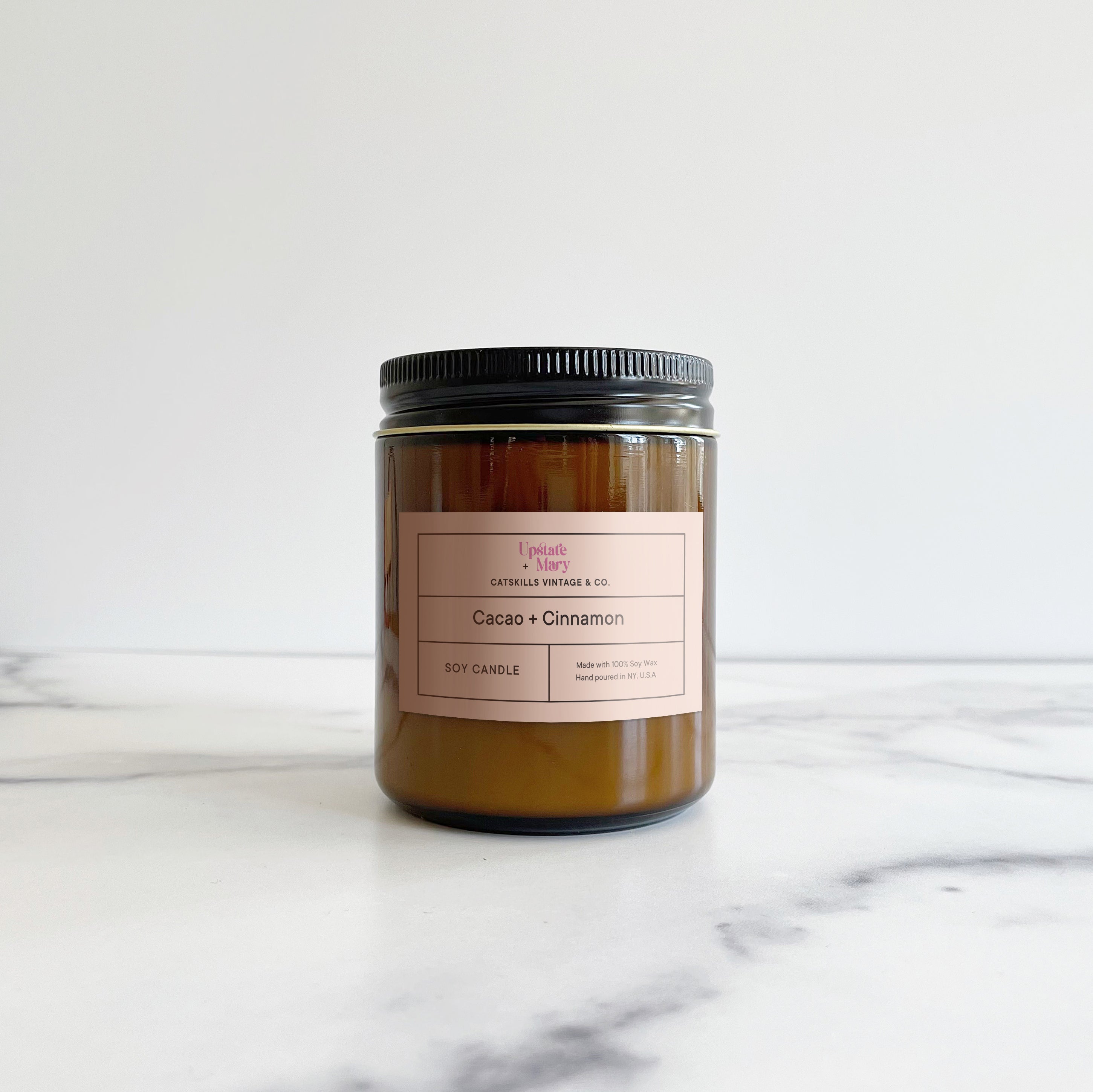 Cacao and Cinnamon soy candle on marble_luxury candle_vanilla_hemp